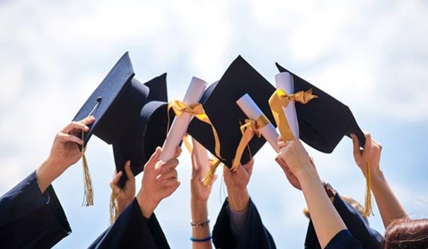 Graduates celebrate at a ceremony, showcasing success in the vet sector.